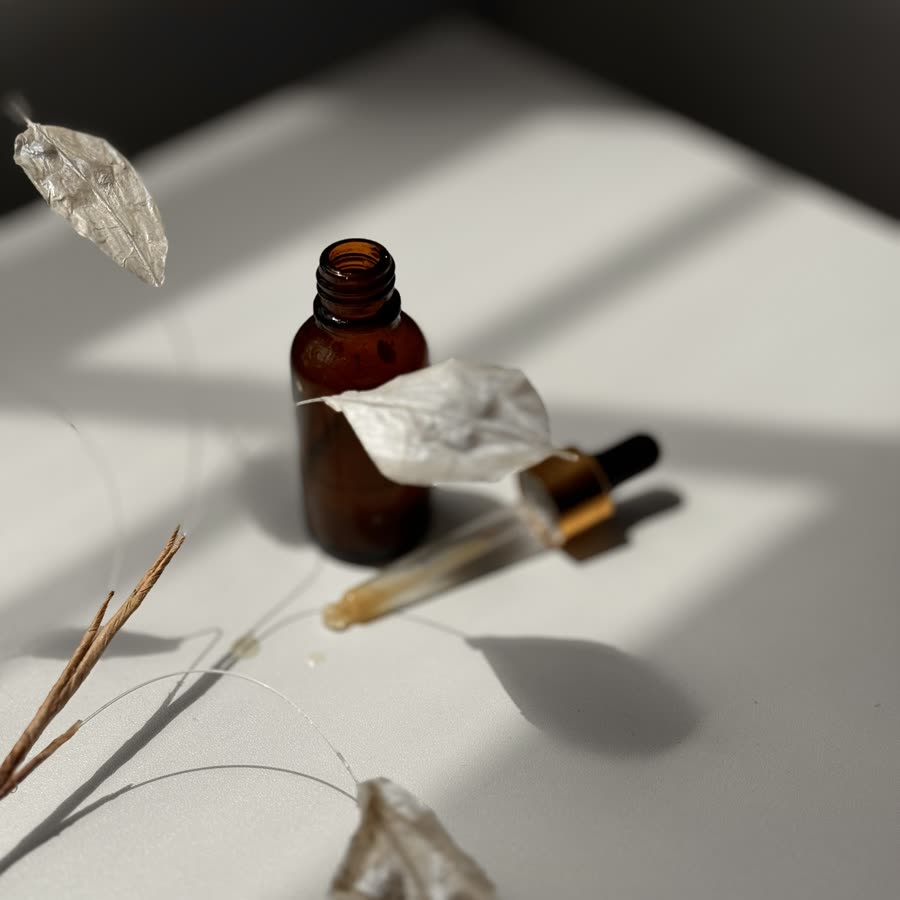 Face oil in amber glass bottle